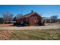 Classic brick home with a covered porch, set on a spacious lot at 850 Dunns Mountain Church Rd # 1, Salisbury, NC 28146