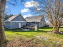 Expansive backyard featuring a spacious deck perfect for outdoor entertaining and relaxation at 111 Oakwood Dr, Kings Mountain, NC 28086