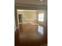 Inviting living room with abundant natural light from large windows at 1229 Mcgill Pond Ln, Rock Hill, SC 29732