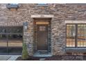 Close up of the stone work around the front door of this charming house at 302 Ambleside Village Ln, Davidson, NC 28036