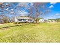 Charming home with manicured lawn and mature trees at 341 Massey Deal Rd, Statesville, NC 28625
