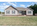 Well-kept home with tidy lawn, simple landscaping and neutral color scheme at 430 Cress School Rd, Salisbury, NC 28147