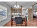 Bright dining room featuring a table, chairs, and view into the kitchen at 524 Damascus Church Rd, Statesville, NC 28625
