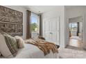 Cozy bedroom featuring neutral decor, bench and soft carpet at 558 Mountain View Dr, Monroe, NC 28110