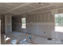 Unfinished living room with newly installed drywall, ready for customization at 635 Acre Ct, York, SC 29745