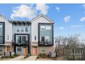 Charming townhouse with a modern exterior and a quaint balcony area at 2132 Electric Ln, Charlotte, NC 28205