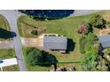 An aerial view of a property shows the home, driveway, and lot lines at 3808 22Nd Street Ne Ct, Hickory, NC 28601