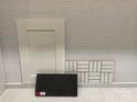 Showcasing a selection of interior design materials, including a white cabinet door and backsplash tile samples at 407 Sunharvest Ln, Indian Trail, NC 28079