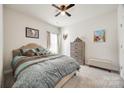 Comfortable bedroom featuring a ceiling fan and natural light at 7133 Yardley St, Gastonia, NC 28056
