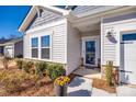 Close up of the front entrance, landscaping and front door at 7133 Yardley St, Gastonia, NC 28056