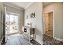 Welcoming foyer with hardwood floors and neutral paint at 7133 Yardley St, Gastonia, NC 28056