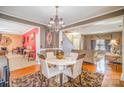 Living room featuring a fireplace, ceiling fan, and comfortable seating at 8134 Chatham Oaks Dr, Concord, NC 28027