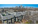 Aerial view of modern townhomes with rooftop terraces and views of the Charlotte skyline at 904 Van Every St, Charlotte, NC 28205