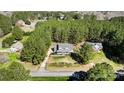 Expansive property surrounded by lush greenery offers privacy and seclusion at 932 Dovefield Dr, York, SC 29745