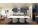 Bright kitchen with blue cabinets, stainless steel appliances, and a large white island with seating for four at 00A Old Pardue Rd, Lancaster, SC 29720