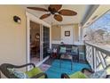 Comfortable patio with a ceiling fan and views at 19827 Henderson Rd # L, Cornelius, NC 28031