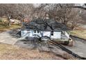 Aerial view highlighting the home's back exterior, spacious yard, and convenient driveway at 934 W Nc 150 Hwy, Lincolnton, NC 28092