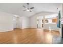 Bright living room showcasing hardwood floors, and an open view to the kitchen at 2018 Arlington Ave, Statesville, NC 28677