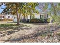 Single-story home with a well-manicured front lawn and mature trees at 629 Johns Ln, Gastonia, NC 28052