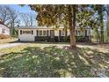 Well-maintained front yard with lush grass and a quaint single-story home at 629 Johns Ln, Gastonia, NC 28052
