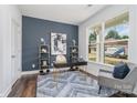 Cozy office space with a modern desk, stylish decor, and a large window offering ample natural light at 1809 Country Club Rd, Lincolnton, NC 10757