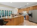 Bright kitchen showcases stainless steel appliances, a breakfast bar, and lots of storage space in the cabinetry at 2177 Galloway Sw Ln, Concord, NC 28025
