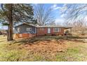 Ranch home featuring brick and vinyl siding, providing a comfortable and stylish exterior at 605 18Th Nw St, Hickory, NC 28601