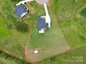 Large lot showing property line and home featuring a well-maintained lawn and neighborhood at 623 Plowshare Way, Clover, SC 29710