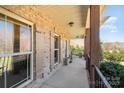 Covered porch with brick columns, offering an inviting outdoor space at 8137 Caliterra Dr, Charlotte, NC 28227