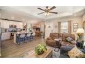 Spacious living room with an open floor plan, a kitchen island, and comfortable seating; perfect for entertaining guests at 1016 E 10Th St, Kannapolis, NC 28083