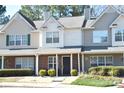 Inviting townhouses featuring varied exterior finishes and manicured landscaping at 12742 Spirit Bound Way, Charlotte, NC 28273