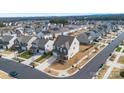 Expansive aerial view showcasing the neighborhood, landscaping, and proximity to nearby attractions at 14815 Superior St, Charlotte, NC 28273