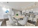 Elegant dining area adjacent to the kitchen, perfect for gatherings at 222 S Caldwell St # 2008, Charlotte, NC 28202