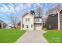 Inviting two-story home with a spacious driveway and well-maintained lawn in a peaceful neighborhood setting at 2765 Bradford St, Gastonia, NC 28054