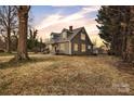 Lovely two-story home with a classic design, nestled on a spacious lot at 56 Linneys Mountain Rd, Taylorsville, NC 28681