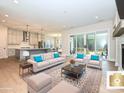 Bright living room with hardwood floors, fireplace, and sliding glass doors to the patio at 1324 Sage Pine Cir, Clover, SC 29710