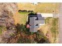 Bird's eye view of the house showcasing the roof and backyard with trees at 2050 Sunswept Ln, York, SC 29745