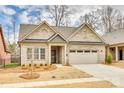 Charming one-story brick home with a two-car garage and manicured front lawn at 333 Lifestyle Ct, Cramerton, NC 28056