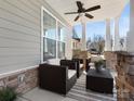 Inviting covered porch with comfortable seating and stylish decor at 4028 Shadowbrook Rd, Waxhaw, NC 28173