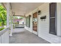 A relaxing porch featuring a classic swing and views of the neighborhood at 1006 N Ridge Ave, Kannapolis, NC 28083