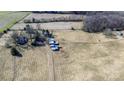 Acreage includes outbuildings and partially wooded area at 169 Eagle Mills Rd, Harmony, NC 28634