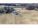 Acreage includes outbuildings and room to roam at 169 Eagle Mills Rd, Harmony, NC 28634