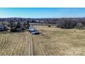 Aerial view of property showing acreage, long driveway and outbuildings at 169 Eagle Mills Rd, Harmony, NC 28634