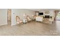 Spacious living room with hardwood floors, fireplace and elegant furniture at 534 Kirby Ln, Matthews, NC 28104