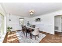 Elegant dining room with hardwood floors, decorative trim, and a stylish chandelier at 7770 Sherrills Ford Rd, Sherrills Ford, NC 28673