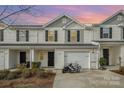 Beautiful townhome with a garage and a charming exterior at 2026 Talbert Ct, Charlotte, NC 28214
