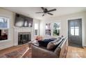 Cozy living room features a fireplace, ample windows, and comfortable seating area at 1937 Wilmore Dr, Charlotte, NC 28203