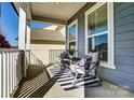 Inviting front porch with seating area, perfect for relaxing and enjoying the outdoors at 2056 Angel Oak Dr, Fort Mill, SC 29715