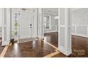 Bright foyer with hardwood floors and elegant trim at 2100 Bluebonnet Ln, Matthews, NC 28104