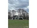 Inviting home exterior featuring a spacious lot and a tranquil, rural setting at 3417 Crowder Ridge Rd, Shelby, NC 28150